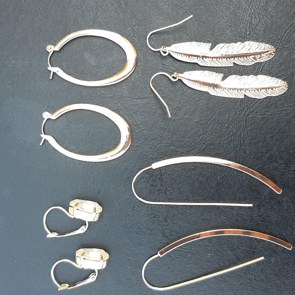 Set of 4 gold colored earings.